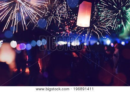 People Celebrate New Year. Fireworks circle blur. Colorful in celebration. Thailand Beach