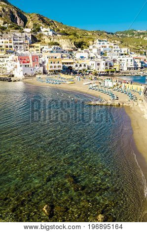 Beach with umbrellas, Italy San angelo, on Ischia, island in bay of Naples, italy