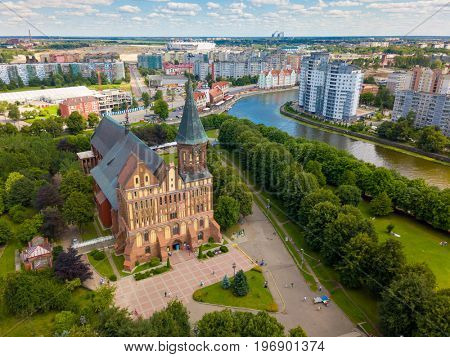 Aerial cityscape of historical city centre at sunny summer day with white clouds in the blue sky. Kaliningrad, Russia