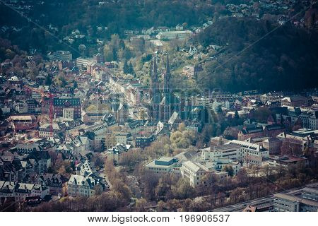MARBURG GERMANY - APRIL 18 2015: The new and the old part of the city from the surrounding hills. Toning. Stylization. Marburg is a university town in the German federal state (Bundesland) of Hessen.