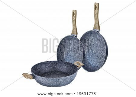 Pans with beige handles art grafit non-stick coating on white background isolation