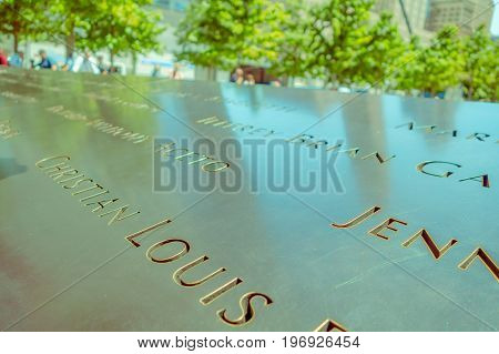 NEW YORK, USA - NOVEMBER 22, 2016: Text close up on Memorial 9-11 monument in Manhattan after the attempted against twin towers in new York Usa.
