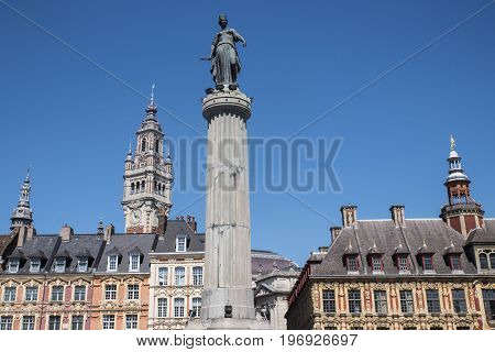 View in Grand Place in the historical city of Lille France. The view includes the Column of the Goddess Vieille Bourse and the chamber of Commerce and Industry.