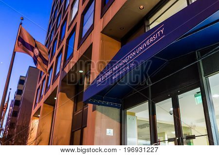 Washington Dc, Usa - March 4, 2017: George Washington University Sign And Entrance With Flag At Nigh