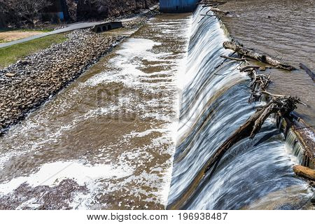 Small Dam With Running Water Fall In Accotink Park In Fairfax, Virginia