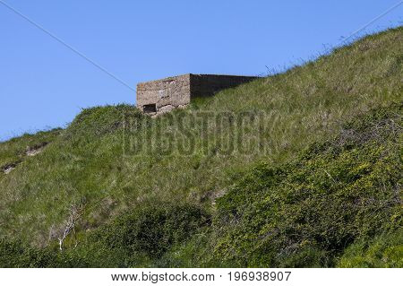A panoramic view showing World War II defences at the estuary in Cuckmere Haven situated in the Seven Sisters Country Park in East Sussex UK.