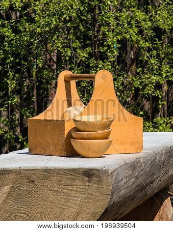 Wooden bowls on a rustic table in a rural place