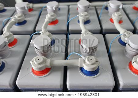 DC battery accumulator. Electric industrial battery direct current and voltage power supply.