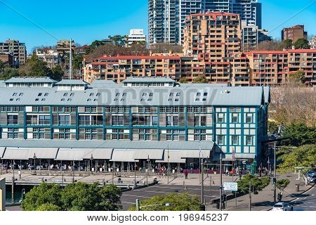 Woolloomooloo Wharf With Woolloomooloo District Cityscape On Thee Background