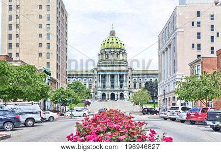 Harrisburg, Usa - May 24, 2017: Pennsylvania Capitol Exterior In City With Many Red Pink Rose Bushes