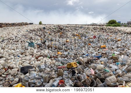 plastic waste dumping landfill site and open burning area