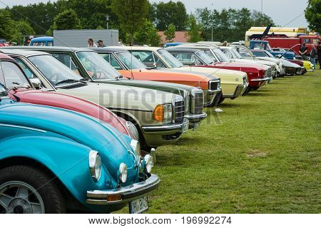 PAAREN IM GLIEN GERMANY - MAY 23 2015: Various retro cars standing in a row in the exhibition field. The oldtimer show in MAFZ.