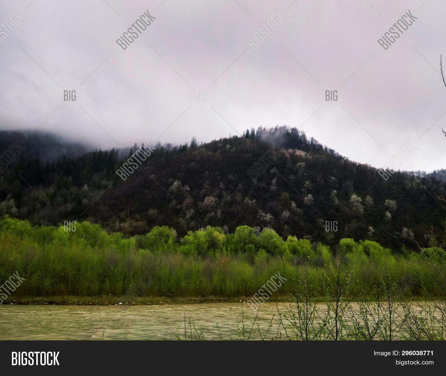 River Bank Raining On River Bank After Image & Photo (Free Trial) | Bigstock