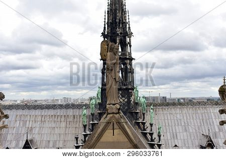 Notre Dame Spire, La Fleche, And Lead Clad Wooden Roofs Before The Fire. Angel Statue, Apostles And 