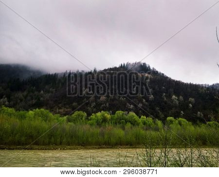 River Bank Raining On River Bank After Image & Photo (Free Trial) | Bigstock