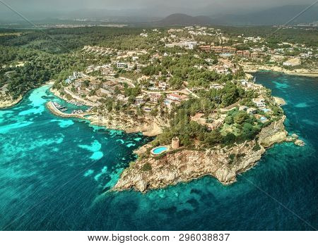 Beautiful birdeye view on the sea coastline with pier and yakhts at sunny day. Travell, jorney,islands, Seascape, freedom, holidays concept.