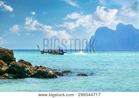 Beautiful Landscape With Traditional Boat On The Sea In Phi Phi Region, Thailand. Travel, Holiday In