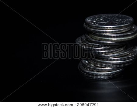 A Stack Of Russian Coins On A Black Background