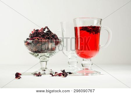 Transparent Glass Cup With Hot Red Tea From Hibiscus Or Hibiscus.