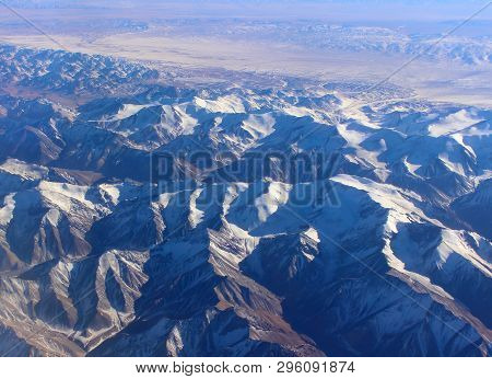 Beautiful View From The Aircraft To The Peaks Of Qilian Mountains Also Known As Nan Shan Or Southern