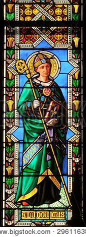 FLORENCE, ITALY - JANUARY 10, 2019: Saint Ludovicus, stained glass window in the Basilica di Santa Croce (Basilica of the Holy Cross) - famous Franciscan church in Florence, Italy