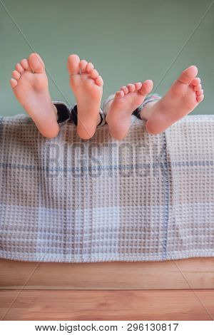 Children Barefeet. Barefeet Of Kids. Toes And Heels Of Two Boys. Body Part, Foot.