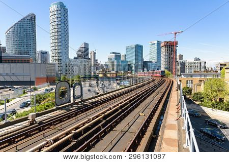 London, Uk - May 1, 2018: Dlr Train Approaching East India Station. The Docklands Light Railway Is A