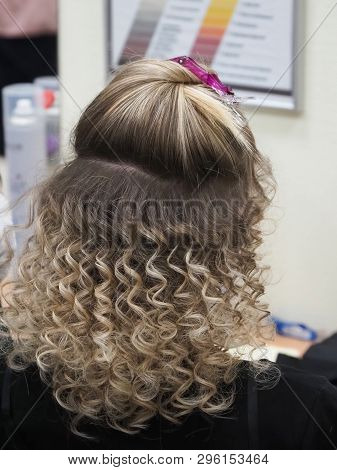 Hair Wound On The Styler. Hair With Curled Curls.