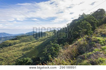 3 Green Tree Mountain With Warm Sun Light And Blue Sky Cloud At Phu Langka National Park Wide. Green