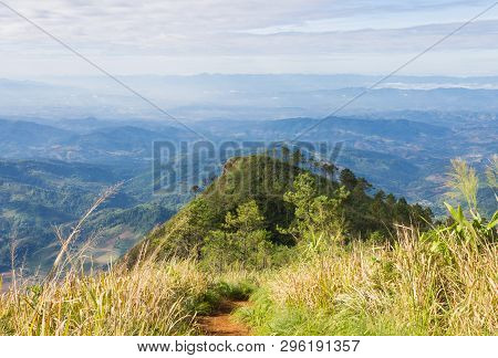 Phu Nom With Grass Field Landscape Mountain Sky And Cloud At Phu Langka National Park Phayao Thailan