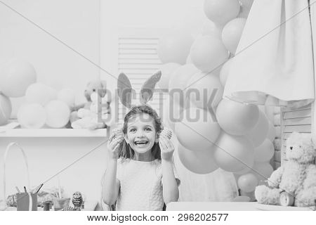 Daughter Paint Handmade Egg At Party Balloons. Gaughter Or Little Girl Kid Paint Easter Eggs