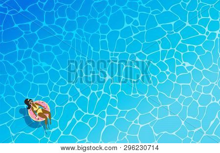Dark-skinned, Swarthy Woman In A Yellow Swimsuit And Sunglasseson An Inflatable Circle In The Form O