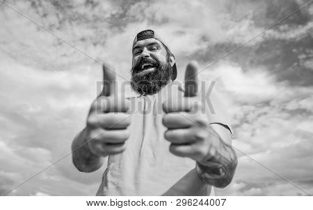 Good Luck. Man Bearded Muscular Brutal Hipster Outdoors Sky Background. Masculinity And Brutality. L