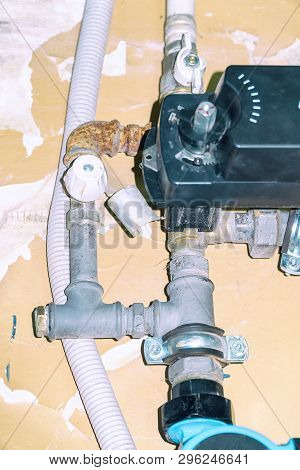 Sanitary Engineering. Connection Of The Supply Pump In The Home Heating System. Connection Of Plasti