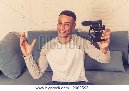 Young Happy Blogger Recording Video On Camera For Internet Blog