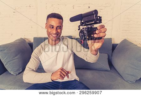 Young Happy Blogger Recording Video On Camera For Internet Blog