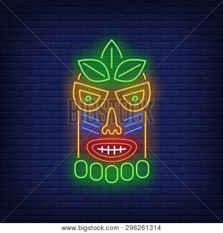 Bright Tribal Mask Neon Sign. Tiki Idol, Ancient Culture Design. Night Bright Neon Sign, Colorful Bi