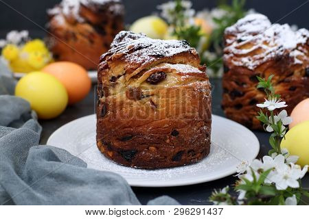 Easter Cake Craffin And Colorful Eggs On A Dark Background