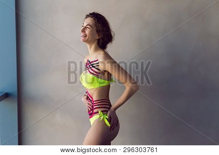 Girl Made Kinesiotape Belly And Chest Standing In The Studio