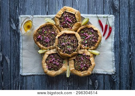 Open Meat Pies On Dark Wooden Background. Top View.
