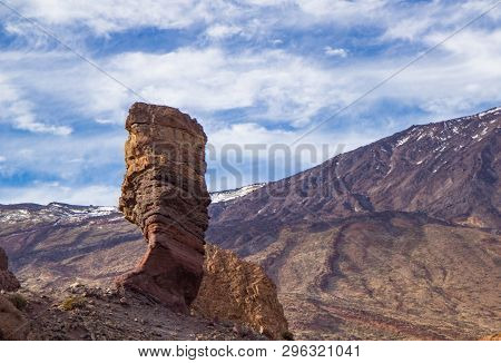 Panoramic View Of Unique Roque Cinchado Unique Rock Formation With Famous Pico Del Teide, Tenerife