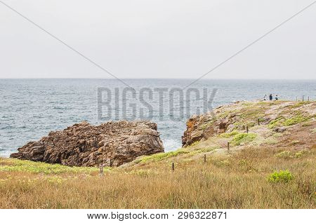 Beach And Cliff In Quiberon In The Morbihan In France, On The Peninsula Of Quiberon