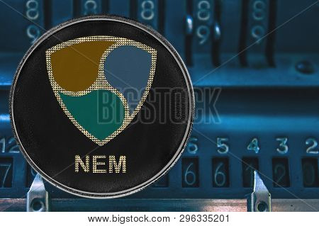 Coin Cryptocurrency Nem And The Numbers Of The Arithmometer. The Concept Of Crypto Xem Token.