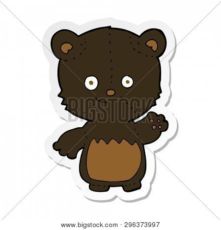 sticker of a cartoon black bearcub waving