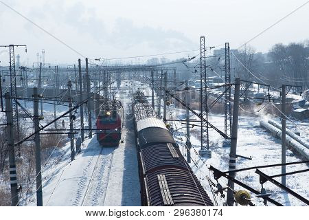 Rail Cars Loaded With Coal Being Transported From Nearby Mines To Power Plants In Winter