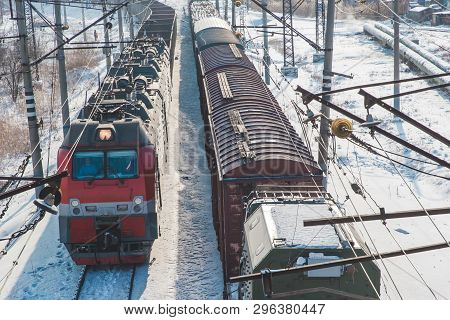 Rail Cars Loaded With Coal Being Transported From Nearby Mines To Power Plants In Winter