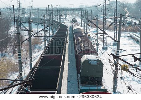 Rail Cars Loaded With Coal Being Transported From Nearby Mines To Power Plants In Winter