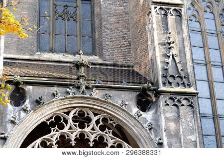 Windows And Door Arch With Gothic Stonemasonry At Southern Facade Of Ulm Minster