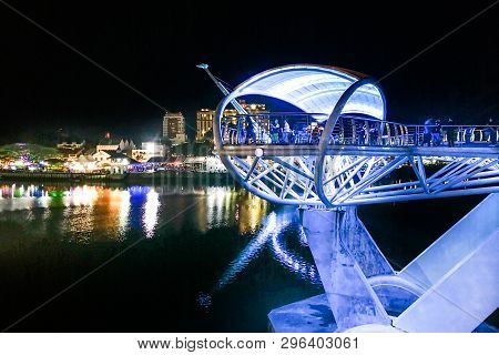 Kuching, Malaysia, April 18, 2019: The Darul Hana Bridge Across Sarawak River Overseeing The Sarawak