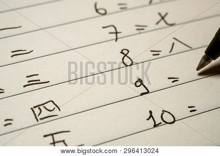 Beginner Chinese Language Learner Writing Numbers In Chinese Characters Macro Shot